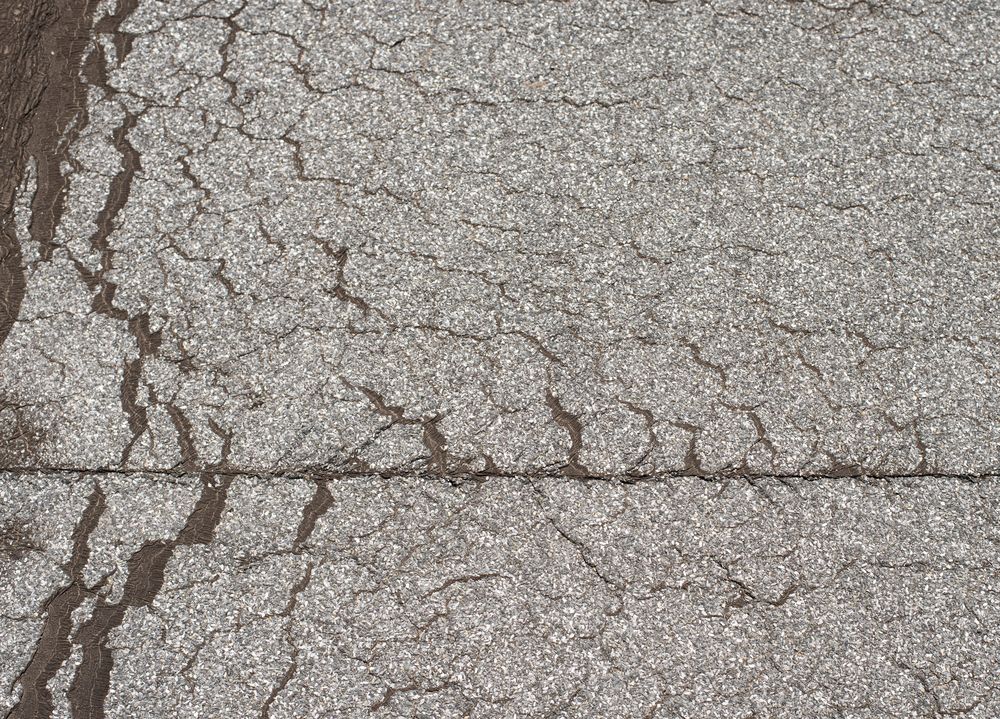 Losliggend dakleer op plat dak in Den Dungen